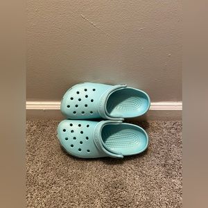 Blue Size 8 Crocs. Lightly used but in great condition!